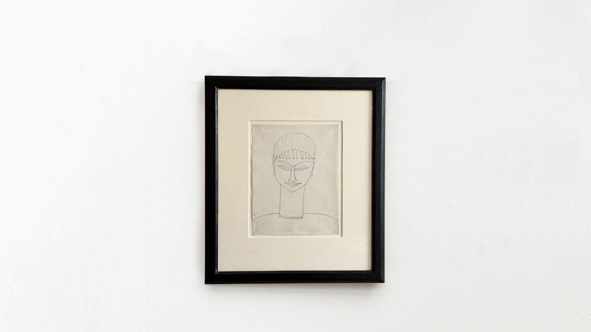 Dessin d'Amedeo Modigliani : tête de face avec collier et boucles d'oreilles représentant une caryatide