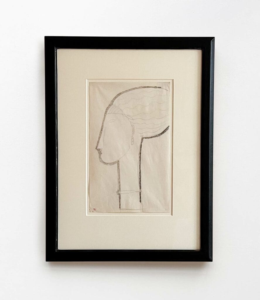 Ce dessin de Modigliani représente une tête de profil à gauche