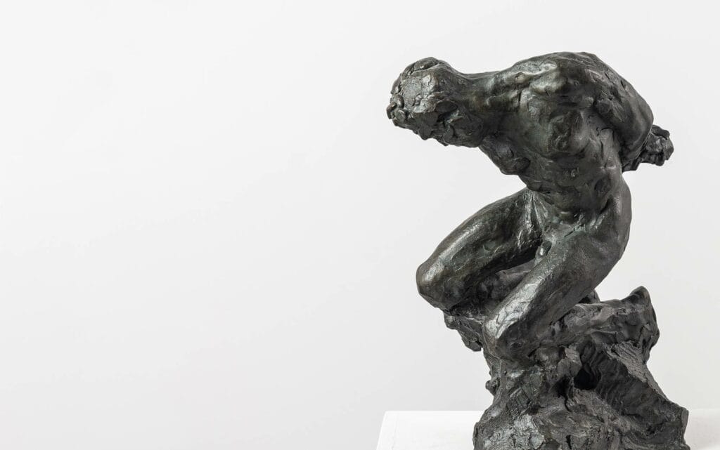 Bronze Art: L'Esclave II par Guy Le Perse. Sculpture d'un homme enchaîné.