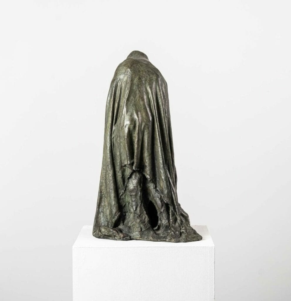 The bronze sculpture "Veiled Shadow I" by Guy Le Perse, inspired by Dante's "Divine Comedy", illustrates a hypocrite in penance in the eighth circle of Hell.