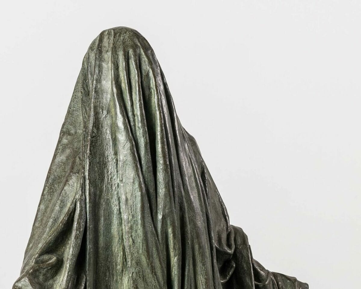 Inspired by Dante's Divine Comedy, Guy Le Perse's bronze sculpture "Veiled Shadow II" represents the hypocrites in the sixth trench of the eighth circle of Hell, a place for fraudsters.