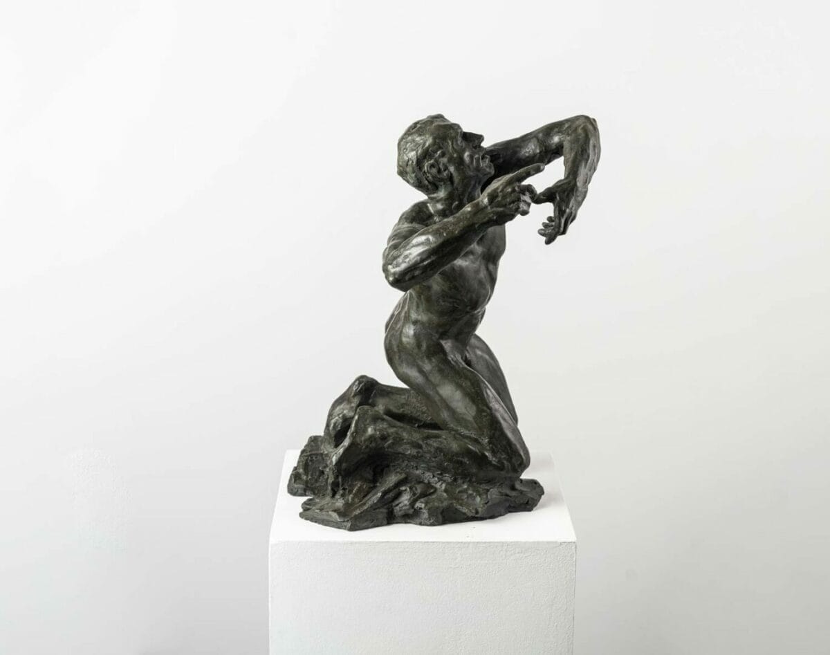 Orpheus rendered in patinated bronze as a nude, kneeling and prostrate figure. By the hand of French sculptor Guy Le Perse.