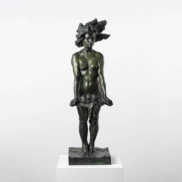 A bronze rendition of Salome by Guy Le Perse, whose French sculpting is inspired by profound myths and the Bible. Additionally, Rodin and Michelangelo influence his work.