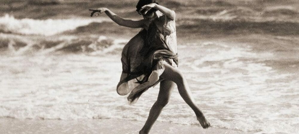 Isadora Duncan dancing on the beach