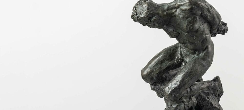 Bronze Art: L'Esclave II par Guy Le Perse. Sculpture d'un homme enchaîné.